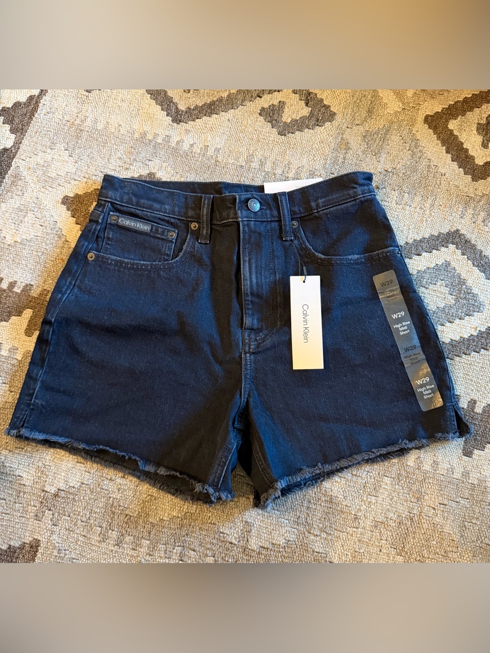 Brand new Calvin Klein cut off shorts size 29